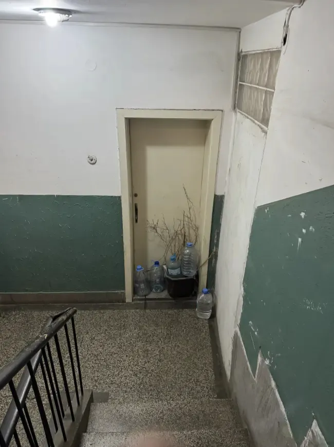 Dark stairwell of our apartment building in Skopje